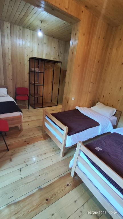 Postel nebo postele na pokoji v ubytování Gaul Gavkhe Hotel