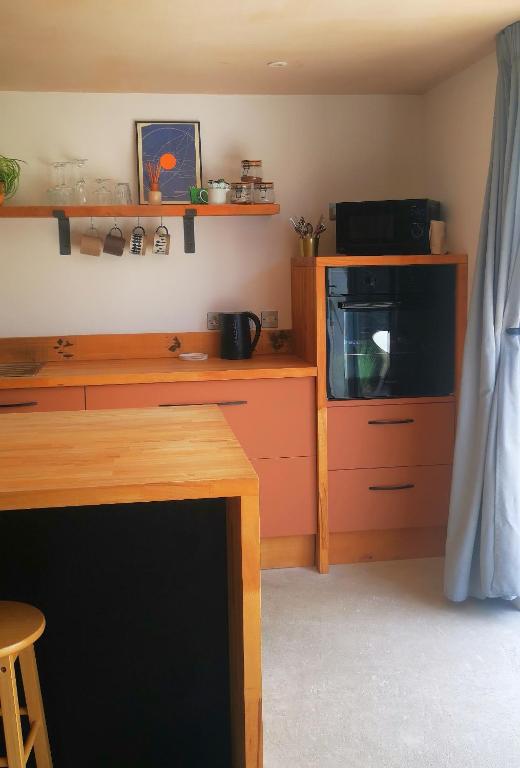 Kuchyň nebo kuchyňský kout v ubytování Gwynn Lodge