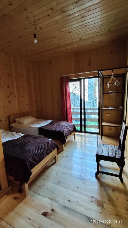Postel nebo postele na pokoji v ubytování Gaul Gavkhe Hotel
