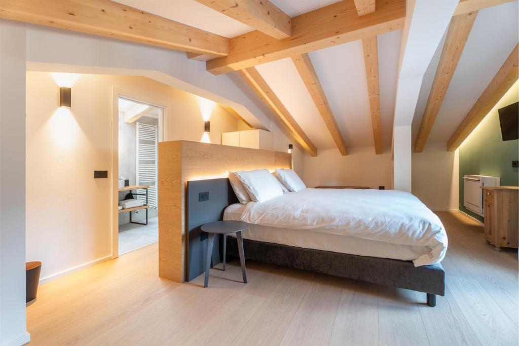Postel nebo postele na pokoji v ubytování Locanda Restel De Fer