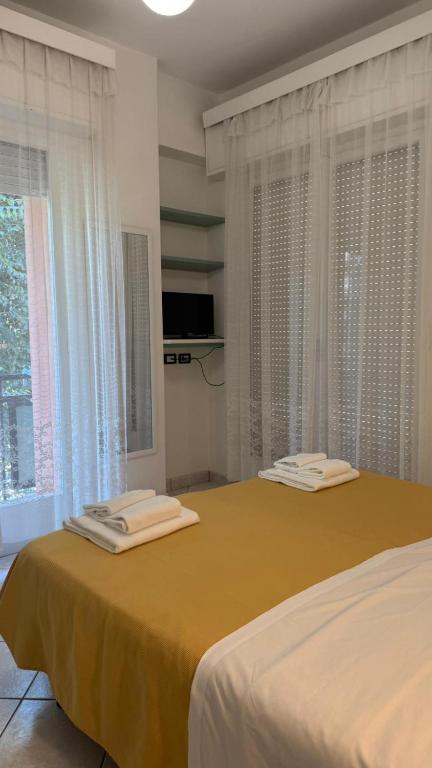 Postel nebo postele na pokoji v ubytování Hotel Ambassador Room Only