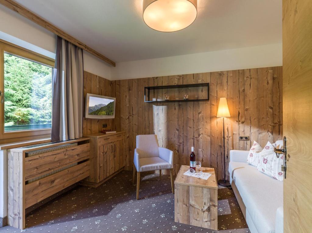 Postel nebo postele na pokoji v ubytování Zeitlos Apartments