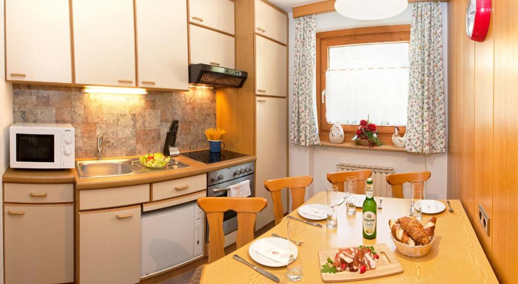 Kuchyň nebo kuchyňský kout v ubytování Zeitlos Apartments