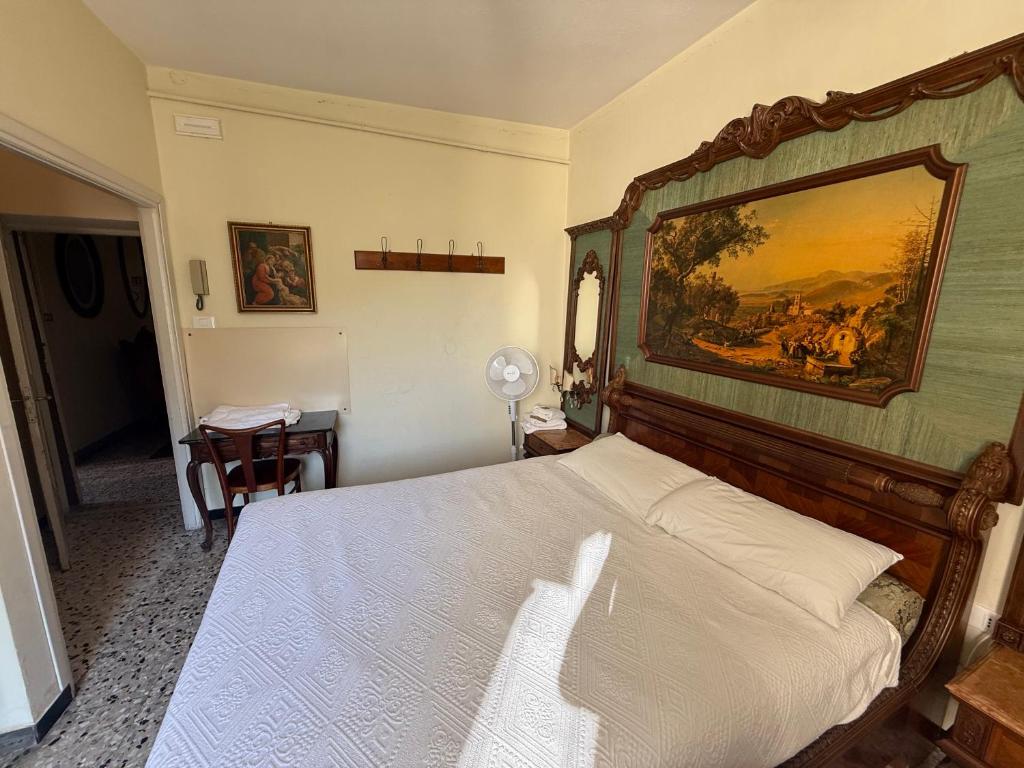 Postel nebo postele na pokoji v ubytování Albergo Dellangelo