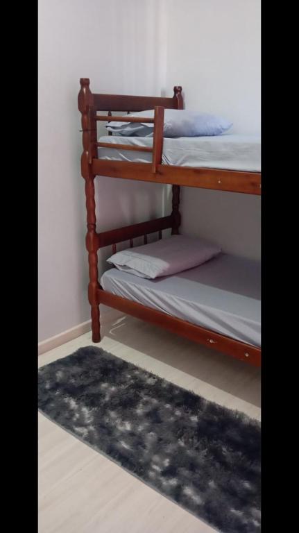 Postel nebo postele na pokoji v ubytování Hospedagem Apolinário
