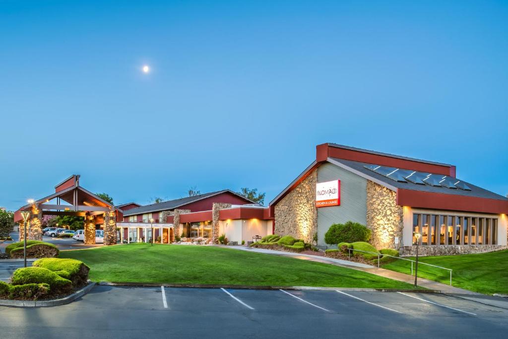 a rendering of a hotel with a parking lot at Red Lion Hotel Kennewick Columbia Center in Kennewick