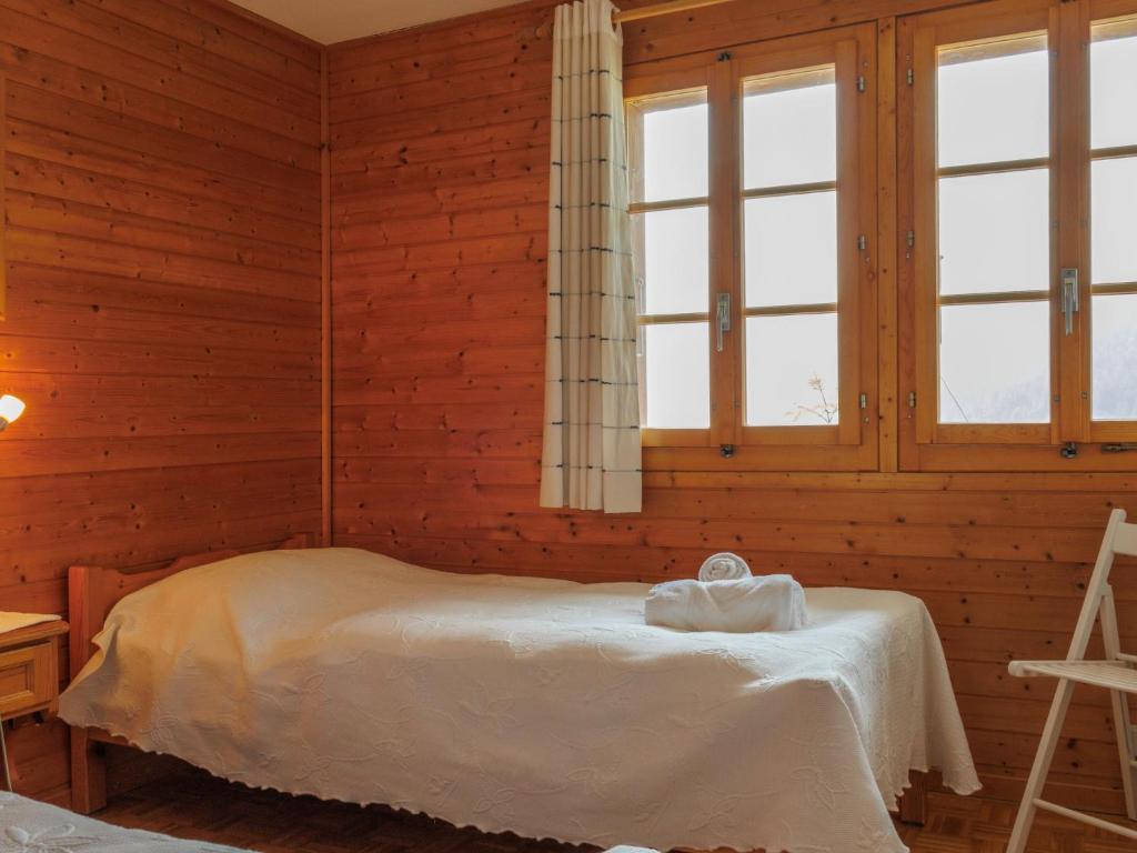 Postel nebo postele na pokoji v ubytování Chalet Les Clarines by Interhome