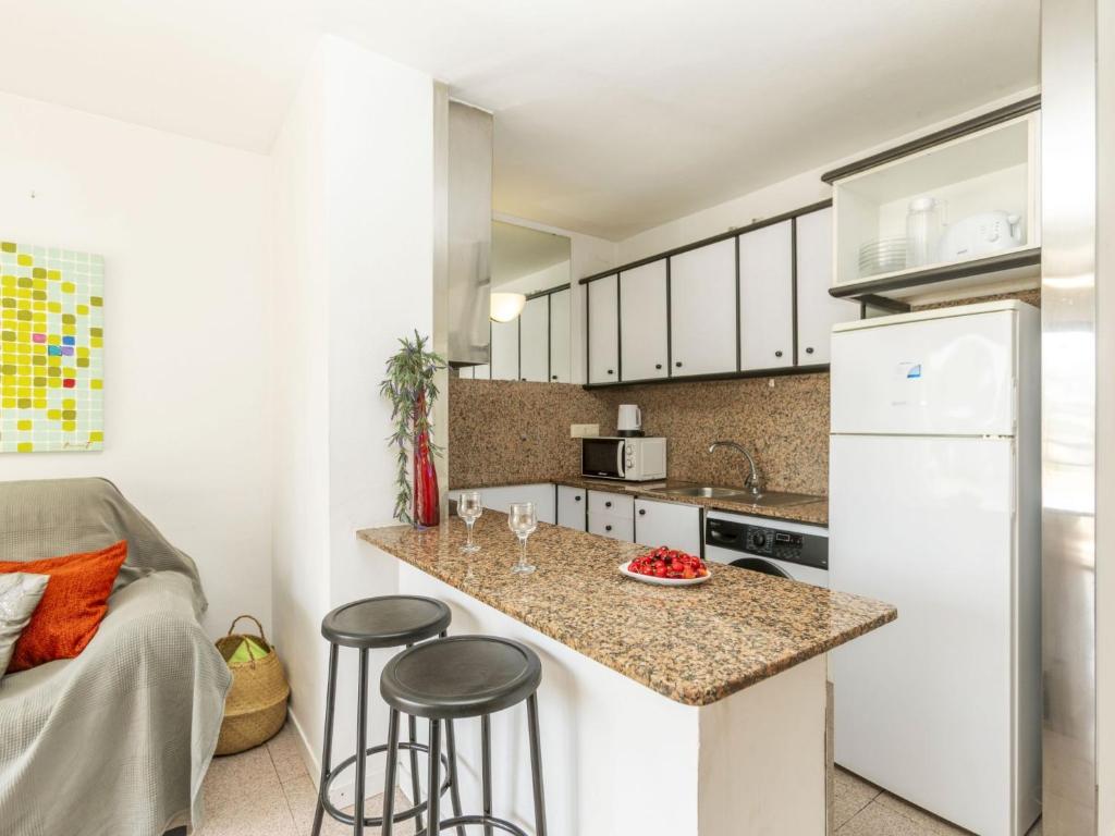 Kuchyňa alebo kuchynka v ubytovaní Apartment Riviera Park J 52 by Interhome