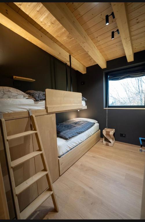 Postel nebo postele na pokoji v ubytování Glam Haus