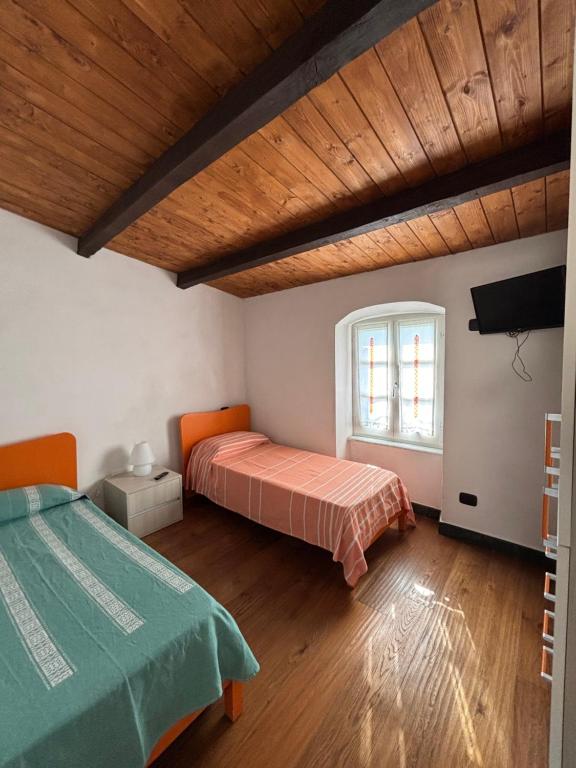 Postel nebo postele na pokoji v ubytování La Torretta