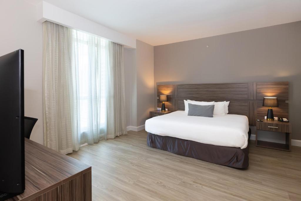 Postel nebo postele na pokoji v ubytování Victoria Hotel and Suites Panama