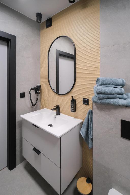 Łazienka w obiekcie Apartamenty i Pokoje Złotobrzeg