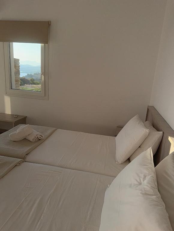 A bed or beds in a room at villa hena