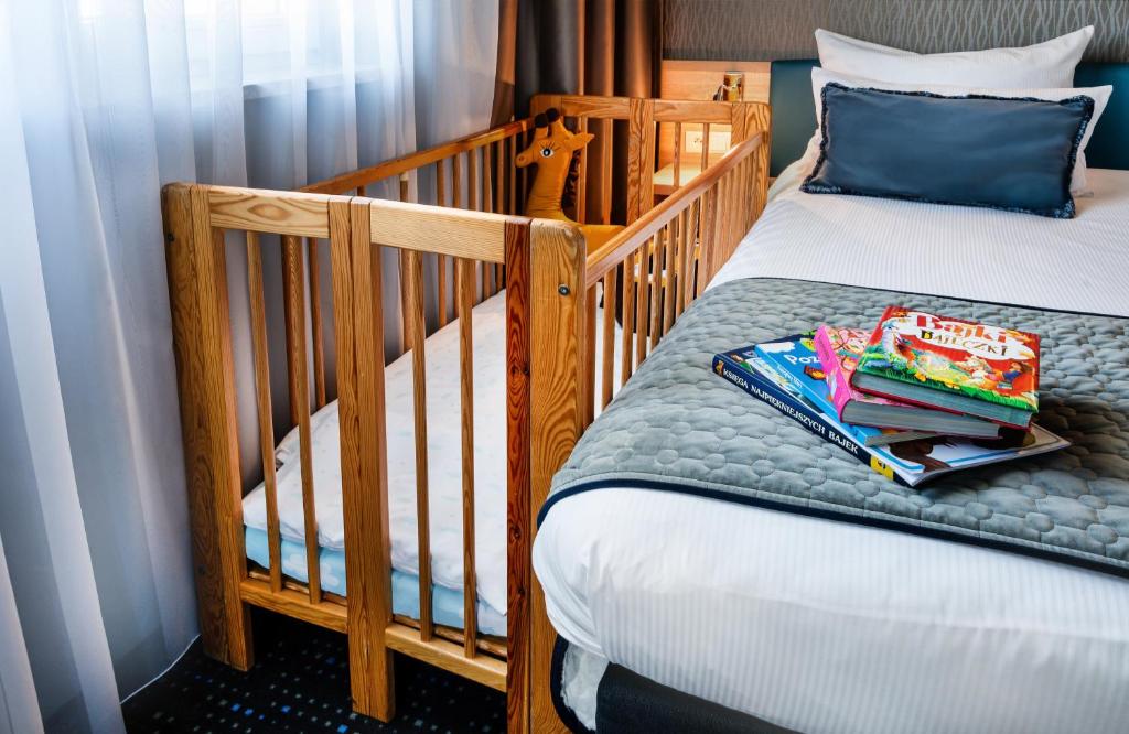 Posteľ alebo postele v izbe v ubytovaní Leonardo Boutique Hotel Krakow Old Town