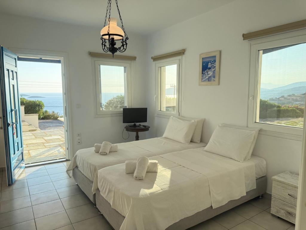 A bed or beds in a room at villa hena