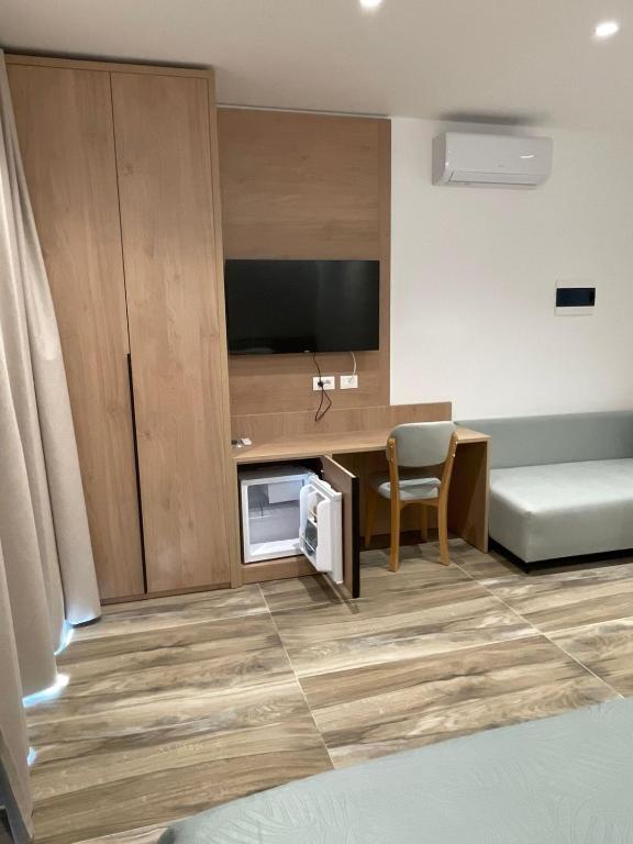 TV a/nebo společenská místnost v ubytování Nettuno Resort Orikum