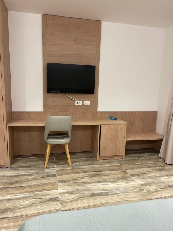 TV a/nebo společenská místnost v ubytování Nettuno Resort Orikum