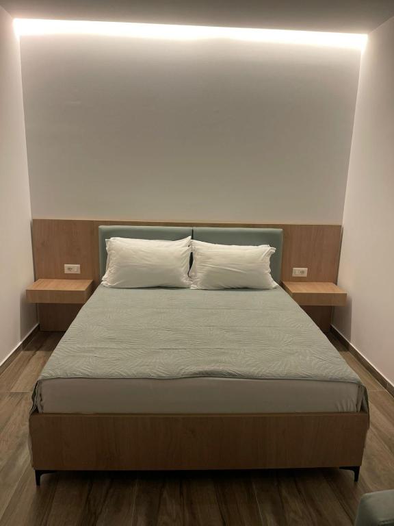 Postel nebo postele na pokoji v ubytování Nettuno Resort Orikum
