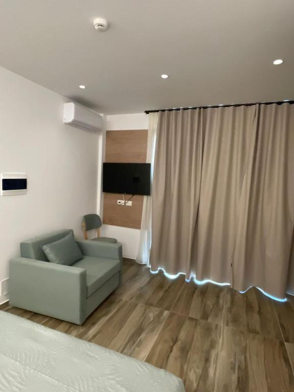 TV a/nebo společenská místnost v ubytování Nettuno Resort Orikum