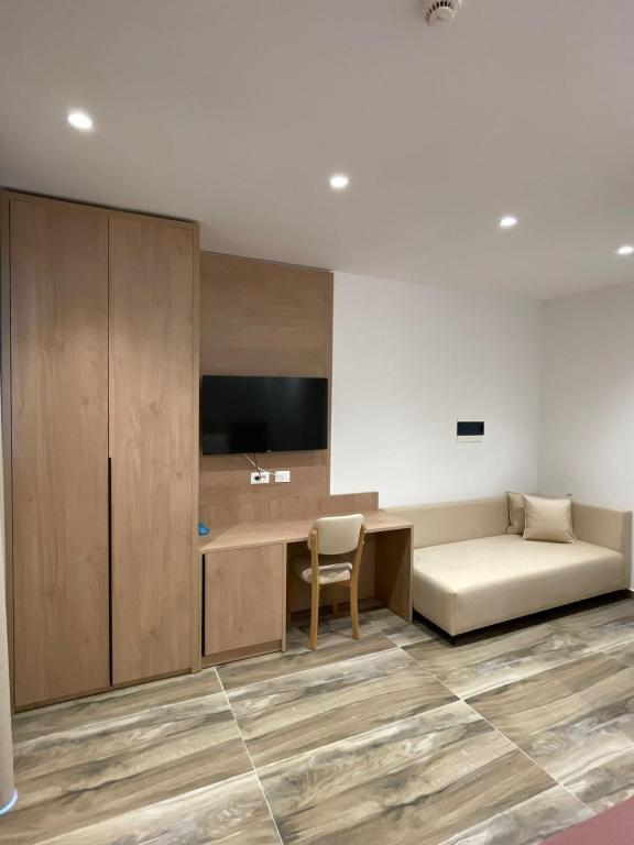 TV a/nebo společenská místnost v ubytování Nettuno Resort Orikum