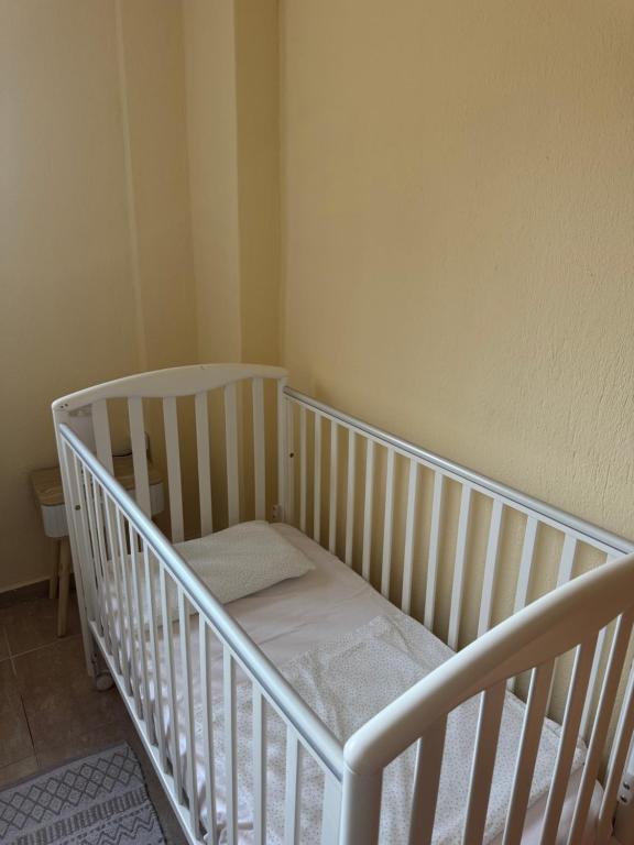 Ένα ή περισσότερα κρεβάτια σε δωμάτιο στο Plagia Oasis Escape