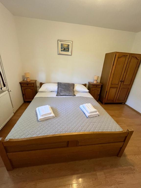 Postel nebo postele na pokoji v ubytování Studio Apartmani Patricia