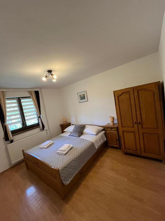 Postel nebo postele na pokoji v ubytování Studio Apartmani Patricia