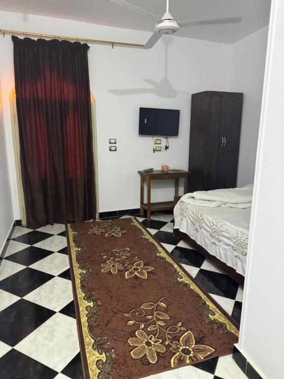 Postel nebo postele na pokoji v ubytování Sunset Guest house