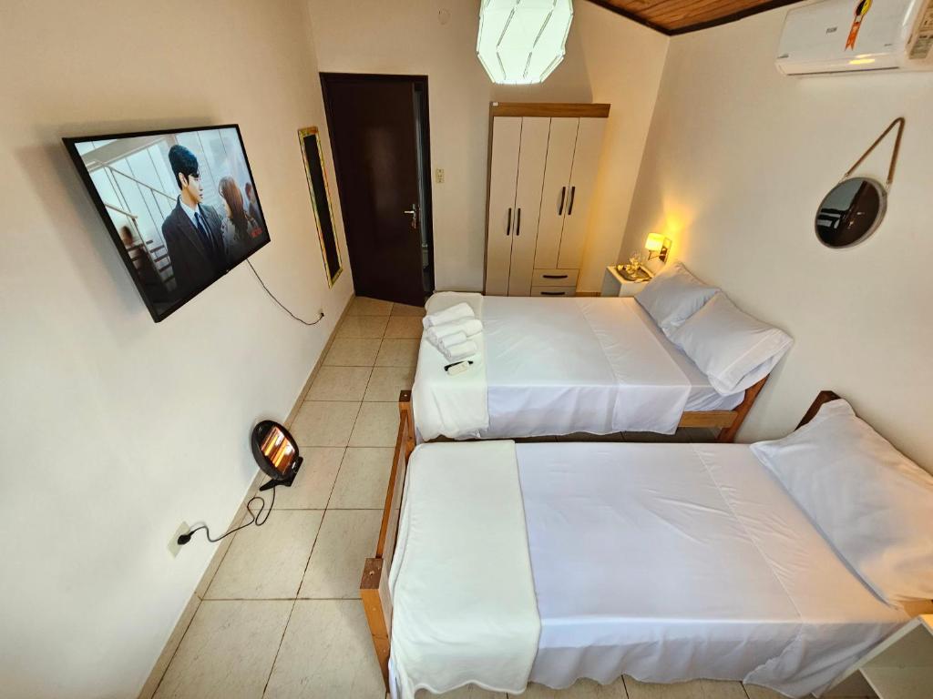 Postel nebo postele na pokoji v ubytování Encarna Hostel