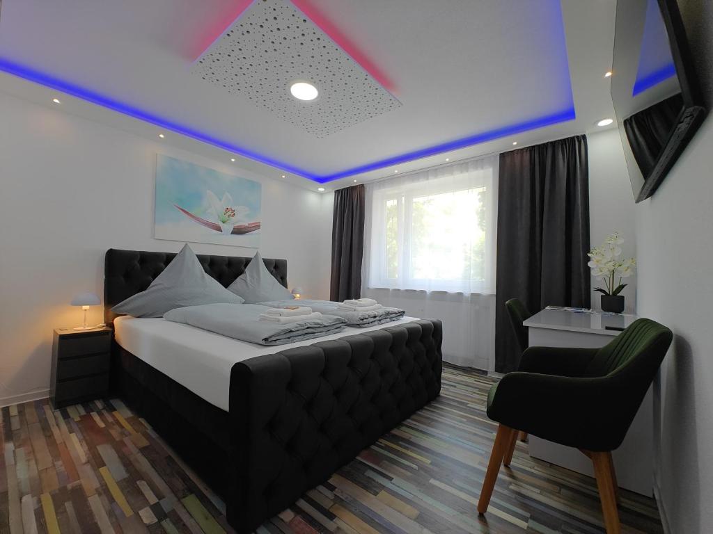 Ένα ή περισσότερα κρεβάτια σε δωμάτιο στο Modern Apartments Neuburg UU - NEU - 2 Zimmer, Komfort, Top Ausgestattet, Smart TV, Wi-Fi