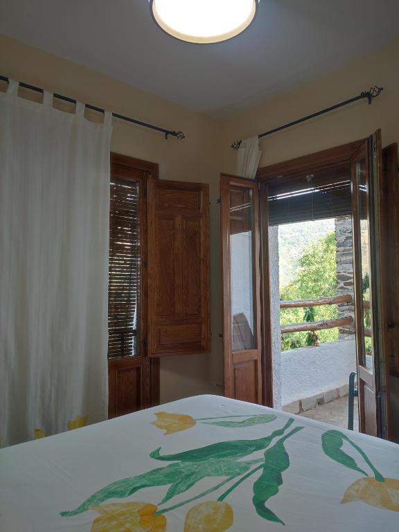 Postel nebo postele na pokoji v ubytování Casa Alpujarreña Fina Número 27