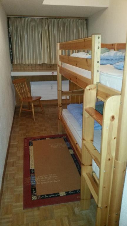 Palanda nebo palandy na pokoji v ubytování Holidays Groupes Anzère