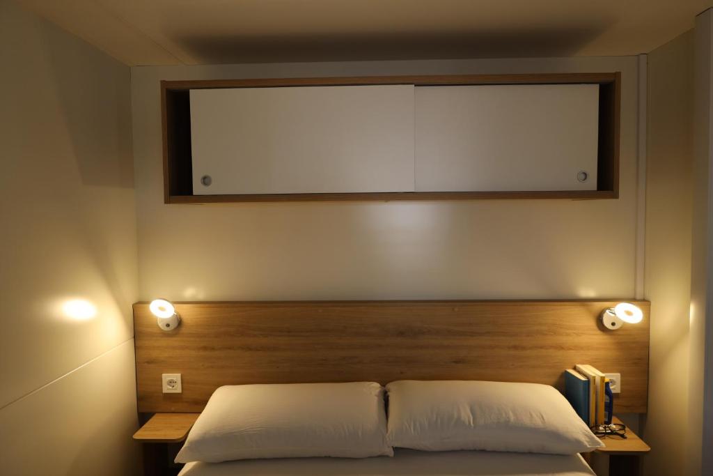 Postel nebo postele na pokoji v ubytování Camping Village Lido di Classe
