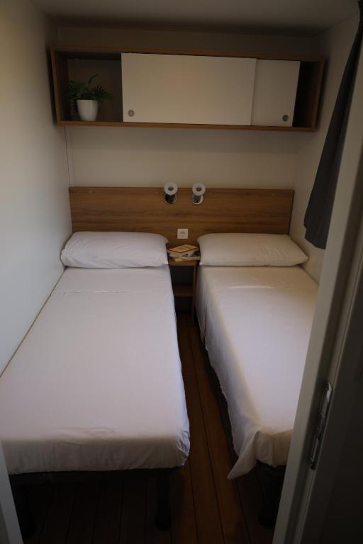Postel nebo postele na pokoji v ubytování Camping Village Lido di Classe