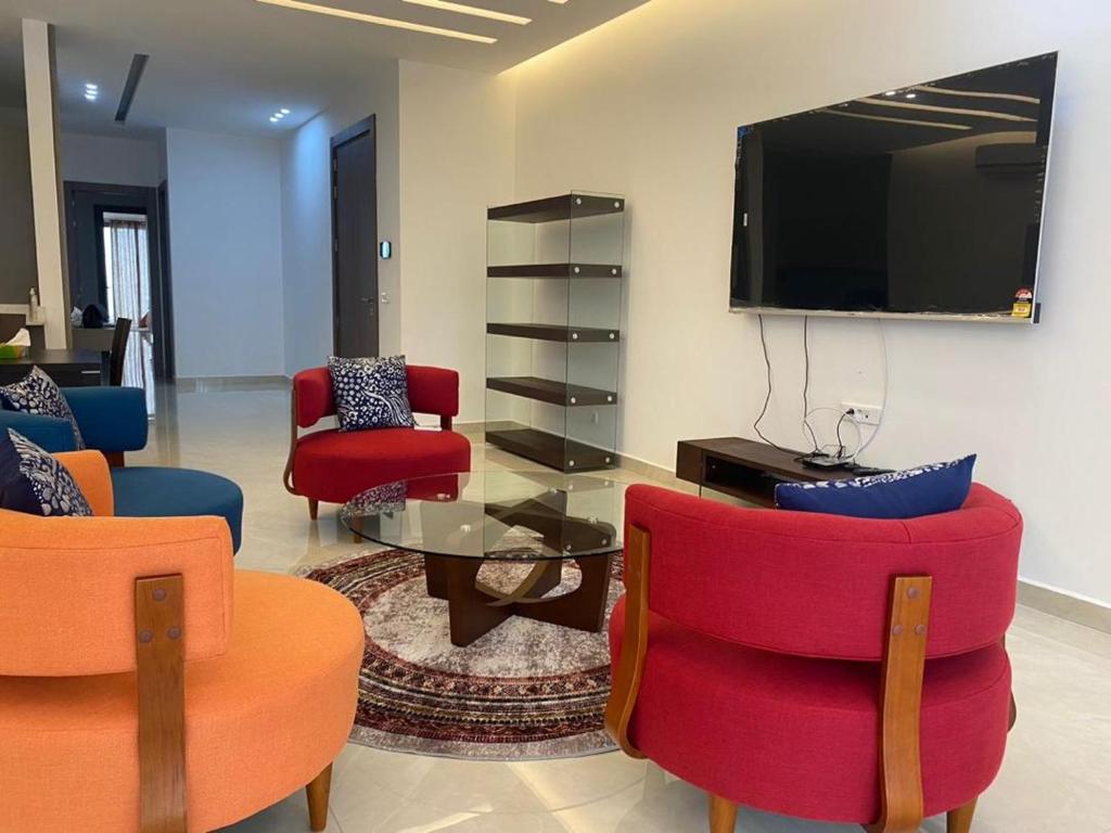 Televizorius ir (arba) pramogų centras apgyvendinimo įstaigoje Franyah résidence