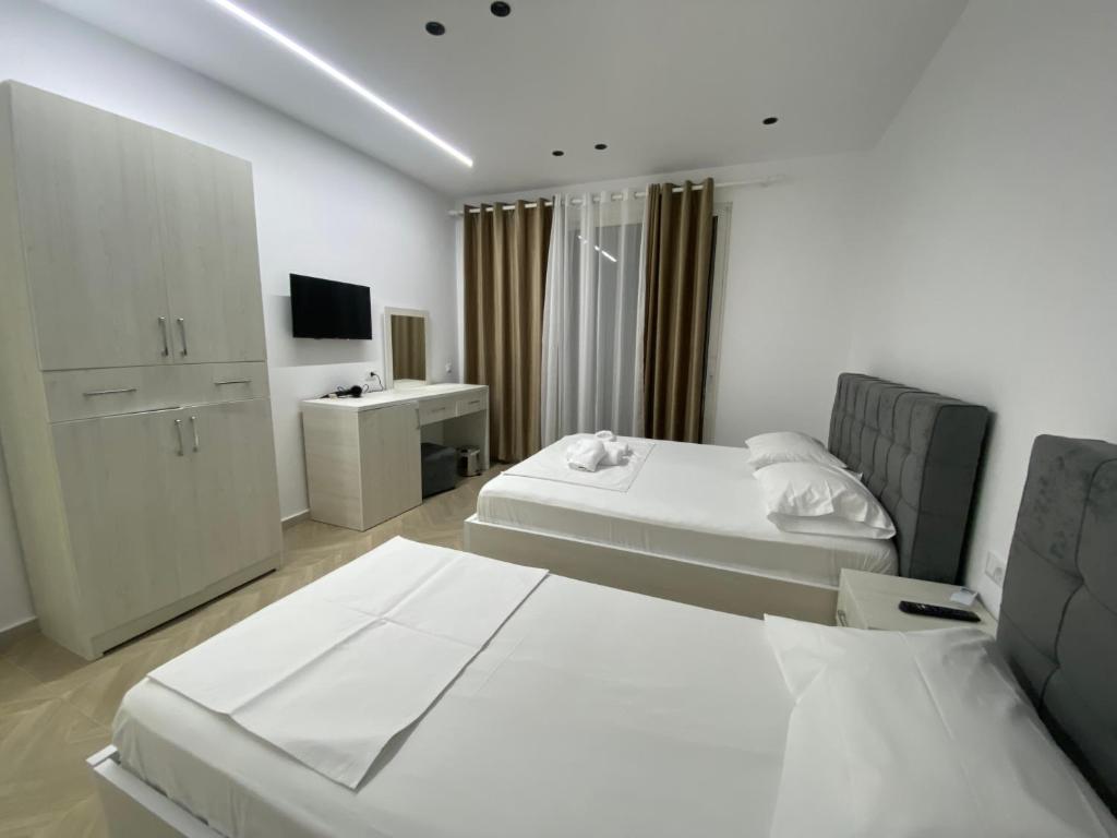 Postel nebo postele na pokoji v ubytování IRINI boutique rooms!!!