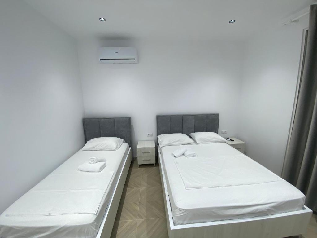 Postel nebo postele na pokoji v ubytování IRINI boutique rooms!!!