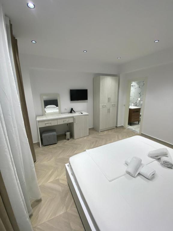 Postel nebo postele na pokoji v ubytování IRINI boutique rooms!!!