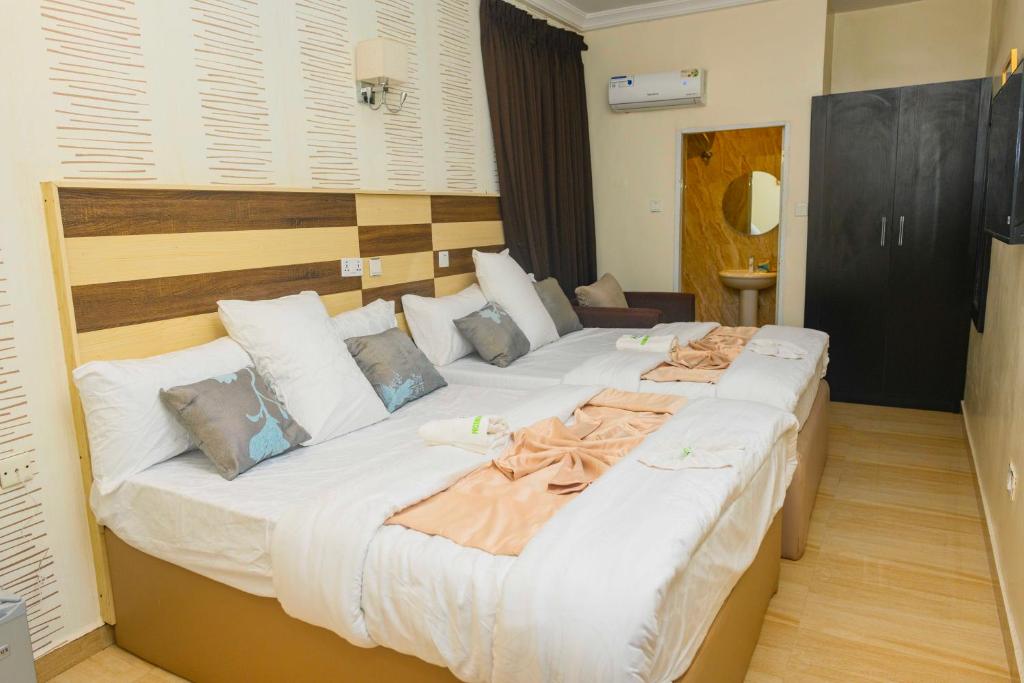 Voodi või voodid majutusasutuse Proximus Hotel and Suites toas