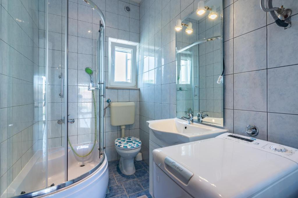 Koupelna v ubytování Mitros Apartment