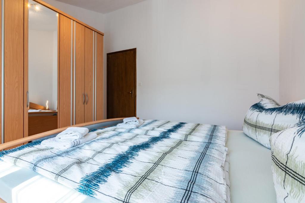 Postel nebo postele na pokoji v ubytování Mitros Apartment