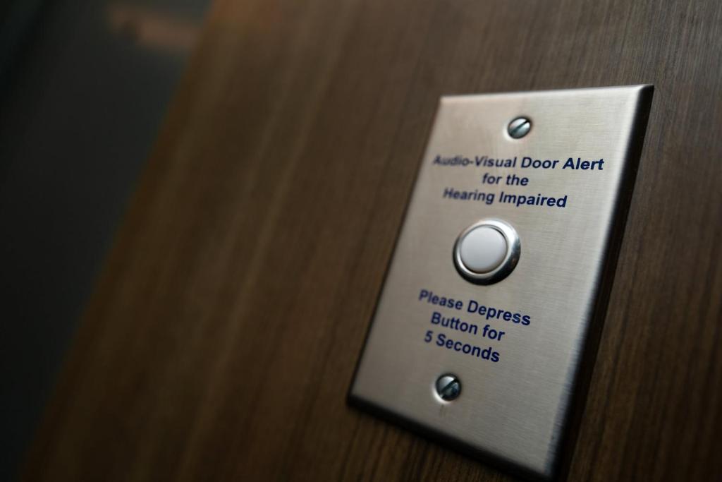 a close up of a remote control on a door at Hotel Indigo Chattanooga - Downtown by IHG in Chattanooga