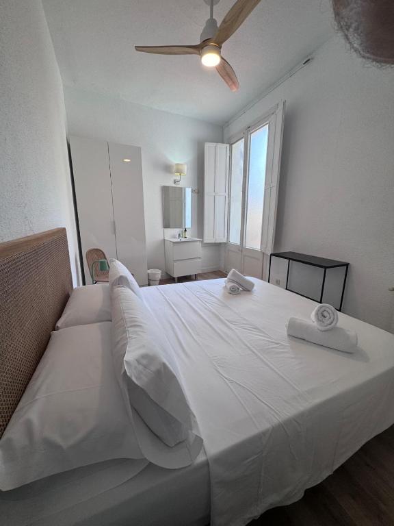 Postel nebo postele na pokoji v ubytování Calma House Rooms