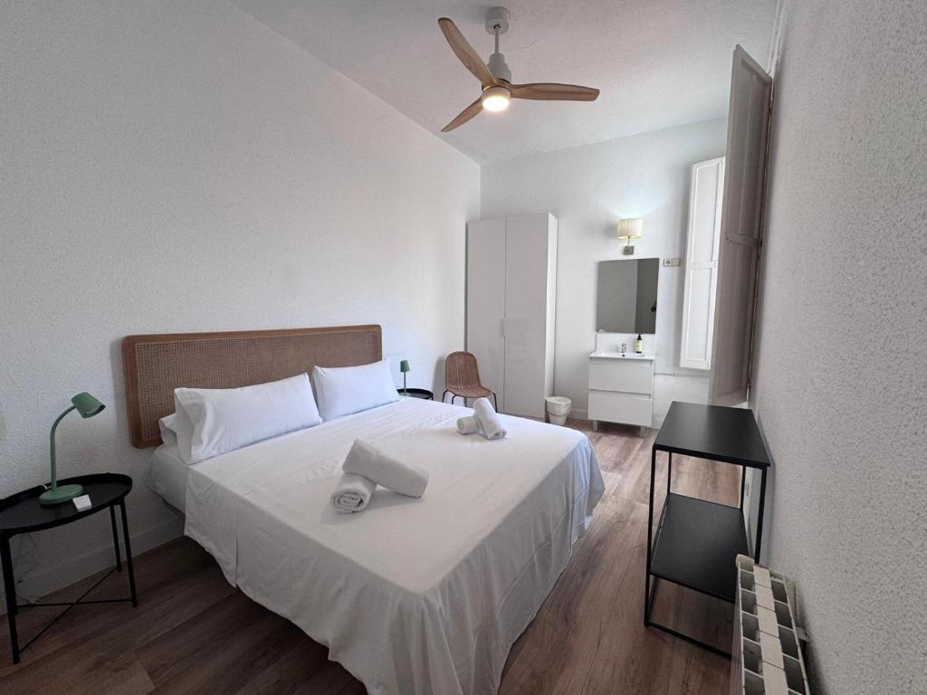 Postel nebo postele na pokoji v ubytování Calma House Rooms