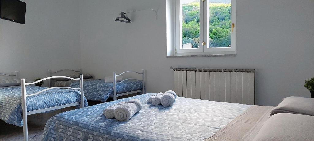 Postel nebo postele na pokoji v ubytování Le Cascate Bed and Breakfast