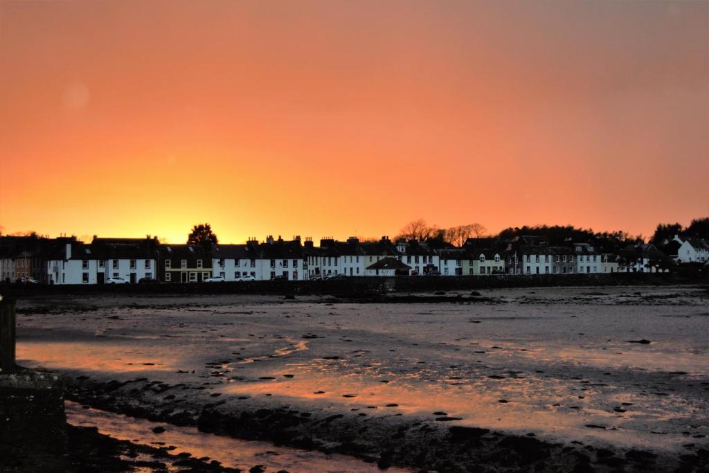 a view of the beach at sunset at Cladach in Garlieston