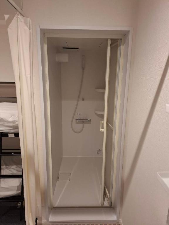 Koupelna v ubytování 駐車場無料 Nagoya Hostel The Three Smiles Free Car Park