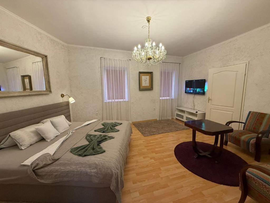 TV a/nebo společenská místnost v ubytování Corte Apartman