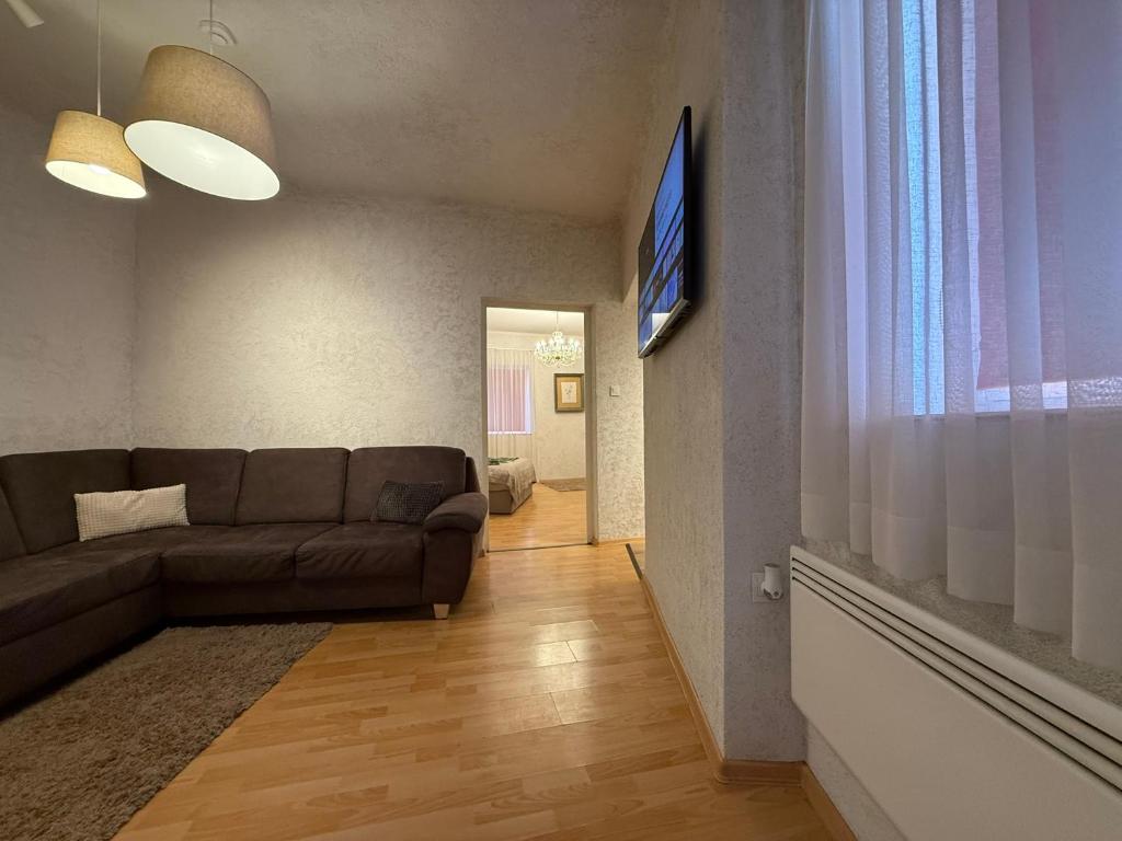TV a/nebo společenská místnost v ubytování Corte Apartman