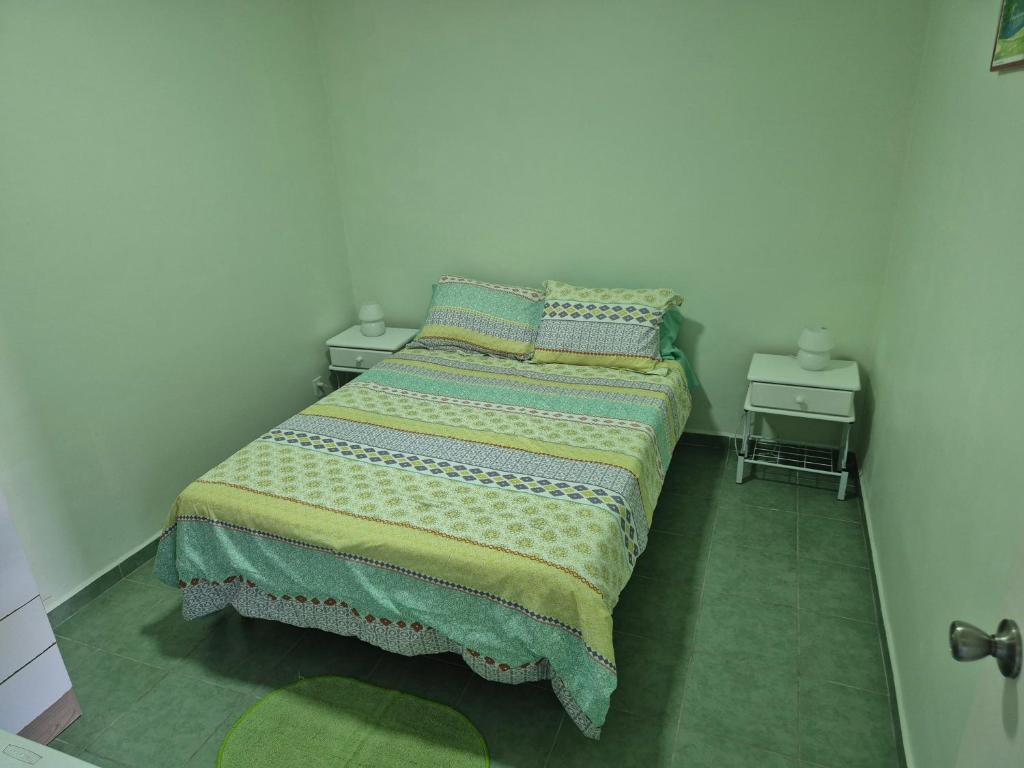 Postel nebo postele na pokoji v ubytování Alifra Apartment